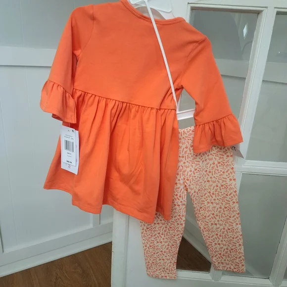 Bonnie Jean Orange Pumpkin Tunic with Cream Bows & Printed Leggings - Picture 2 of 9